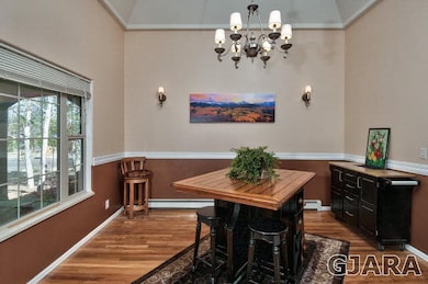 Tall ceilings and classic wainscoting are the hall