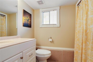 Full bathroom attached to over-sized living room