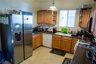 Kitchen with appliances with stainless steel finis