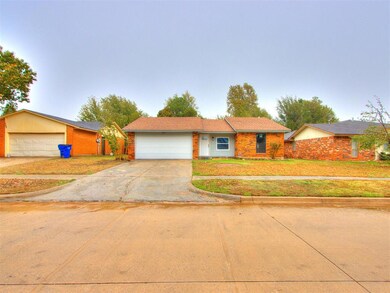 Ranch-style home with a garage