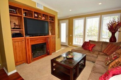 Faux-fireplace adds to the evening comfort.