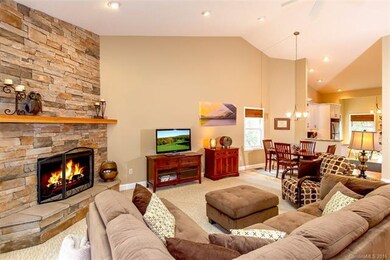 Great room offers a rock gas-burning fireplace, va
