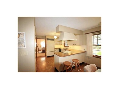 Kitchen. Bright cheery kitchen with breakfast bar.