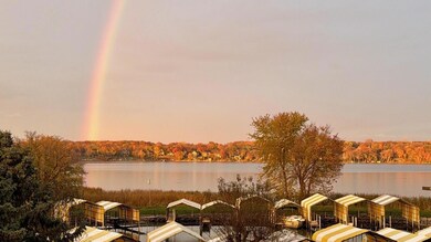 A beautiful fall photo! Enjoy the changing of the seasons and calm fall water with this view!