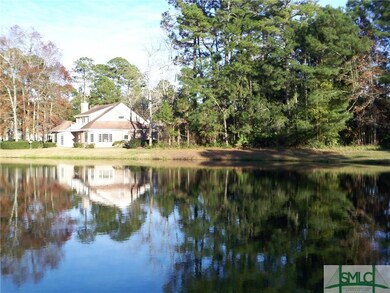 view with natural area on side of house, never to 
