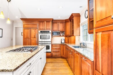large kitchen with view of double oven, built in 
