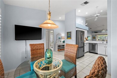 Dining room with visible vents, a ceiling fan, rec