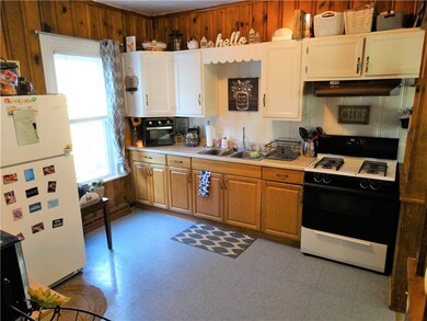 Apt. A has a room kitchen with enough room for an