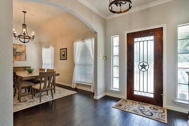 Entrance foyer featuring dark hardwood / wood-styl