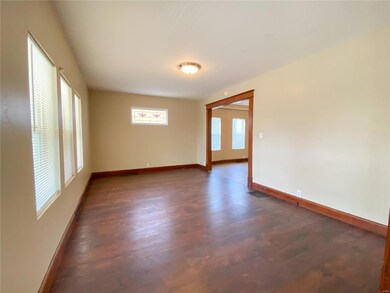 Spacious Living Room with Stained Glass window