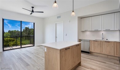 Kitchen featuring tasteful backsplash, visible ven