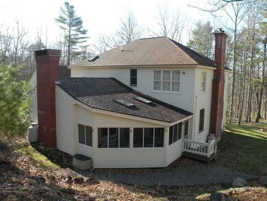 Exterior Back. A screened porch...