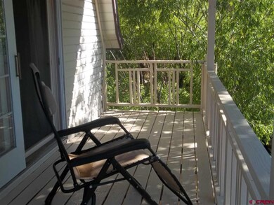 The upper deck is off the master bedroom and built