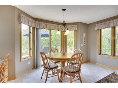 Informal Dining Area with bayed window, patio door