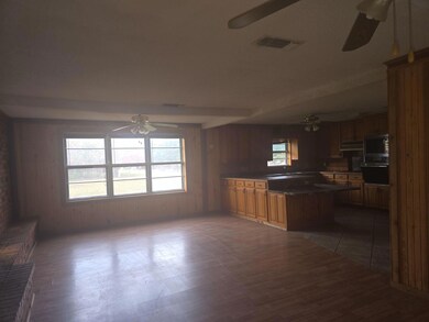 Kitchen with kitchen peninsula, dark hardwood / wo