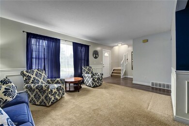 Living room featuring hardwood / wood-style flooring