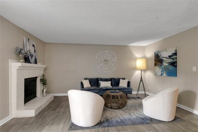 Living room featuring hardwood / wood-style floori