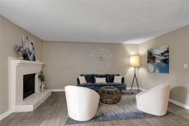 Living room featuring hardwood / wood-style floori