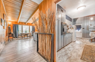Kitchen with wooden walls and oven