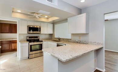 16266 N 29th Dr-large-007-3-Kitchen-1500