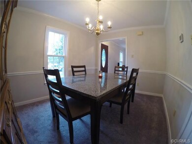LOVELY Dining Room with new carpet, new two tone p