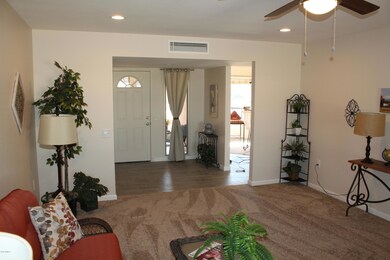 Living room looking into front door