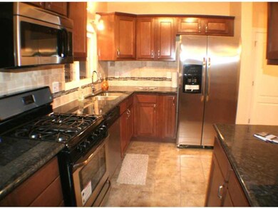 Kitchen. Beautiful Granite Kitchen open to 2nd flo