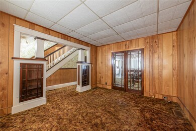 Living room with antique built in shelves