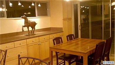 Dramatic dining room lighting.