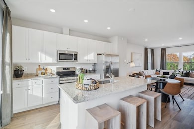 Builder images of a previously built decorated model, finishes, available options, and layout can differ in actual home
