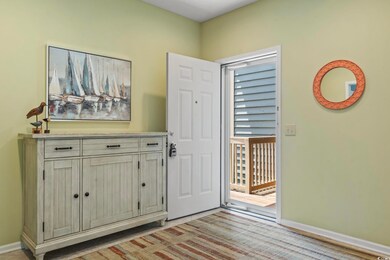 Foyer entrance featuring baseboards