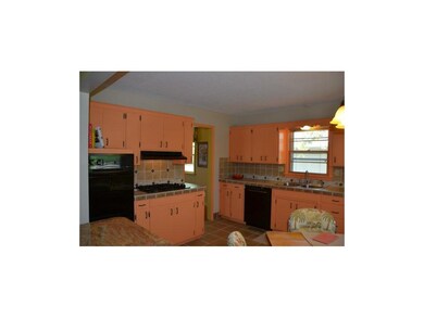Kitchen with gas cook top