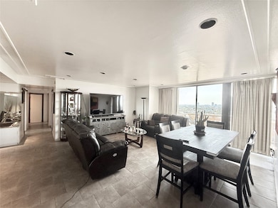 Living room with view toward balcony