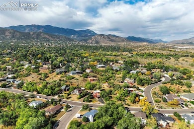 Elevated view of the property with a mountain view