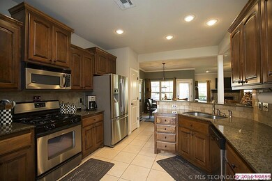 Kitchen w SS appliances & Granite Countertops.