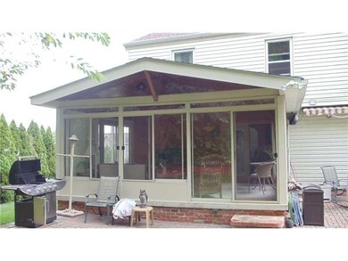 Exterior Back. 3 Seasons Room