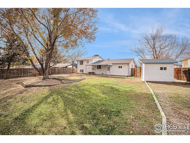 Expansive, fully-fenced yard with endless opportunities!