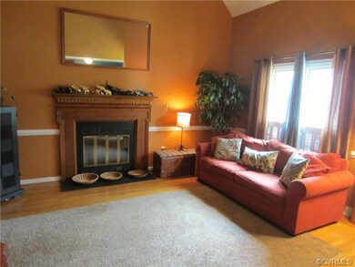 2-Story Living Room has a Soaring Vaulted Ceiling 