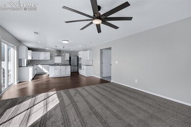 Unfurnished living room with visible vents, a ceil