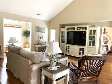 Tall ceilings and a view into the Carolina room give you a sense of awe as you enter.  Stunning bamboo floors!