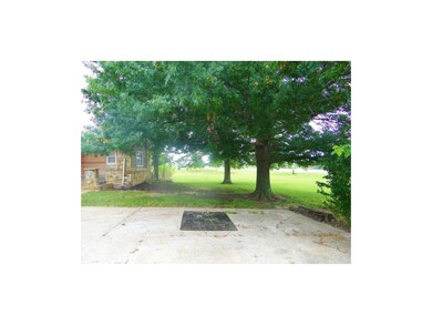 Side of Home, Pretty Lot With Plenty of Treed.