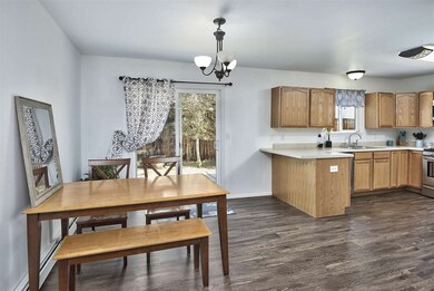 Backyard patio is just steps away from the kitchen