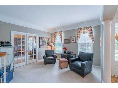 Foyer opens to formal living room.  Glass french d