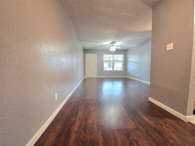 This inviting room boasts freshly painted neutral
