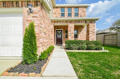WELL LANDSCAPED FRONT YARD.