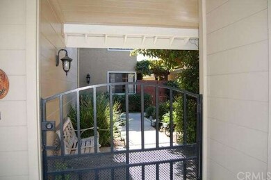 GATED ENTRY TO COURTYARD