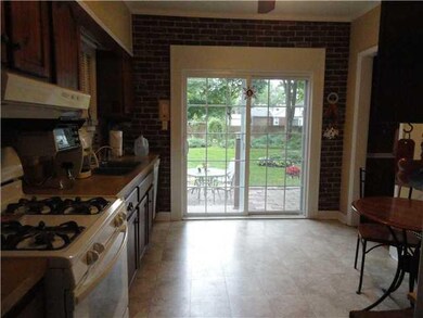 Kitchen. Kitchen looking toward patio doors that o