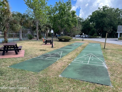 3545 Sable Palm Ln unit D, Titusville, FL 32780 - photo 7