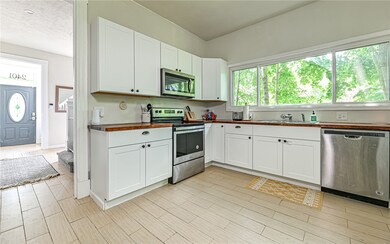 The home boasts a large, open kitchen with tons of