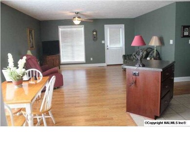 View of open floor plan taken from dining area.
